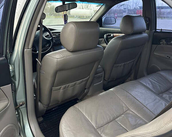 Зеленый Шевроле Эванда, объемом двигателя 2 л и пробегом 240 тыс. км за 1750 $, фото 7 на Automoto.ua