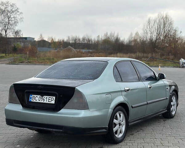 Зеленый Шевроле Эванда, объемом двигателя 2 л и пробегом 240 тыс. км за 1750 $, фото 3 на Automoto.ua