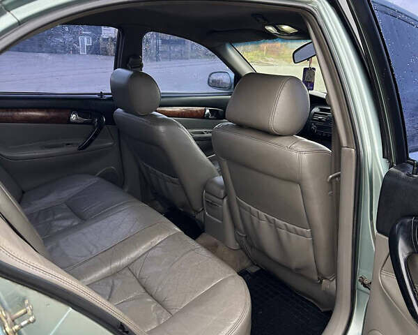 Зеленый Шевроле Эванда, объемом двигателя 2 л и пробегом 240 тыс. км за 1750 $, фото 9 на Automoto.ua