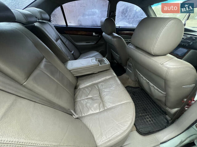 Зеленый Шевроле Эванда, объемом двигателя 2 л и пробегом 245 тыс. км за 1750 $, фото 6 на Automoto.ua