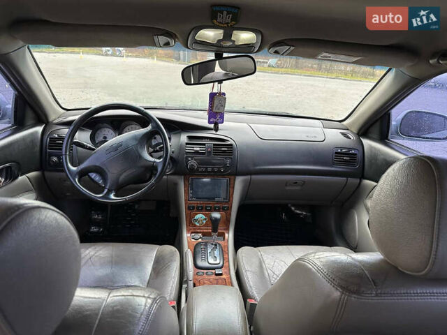 Зеленый Шевроле Эванда, объемом двигателя 2 л и пробегом 240 тыс. км за 1750 $, фото 10 на Automoto.ua