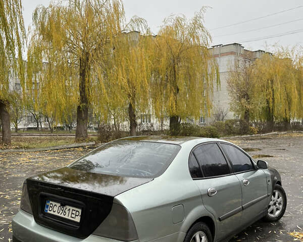Зелений Шевроле Еванда, об'ємом двигуна 2 л та пробігом 242 тис. км за 1299 $, фото 2 на Automoto.ua