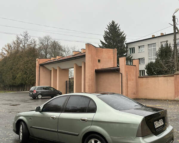 Зелений Шевроле Еванда, об'ємом двигуна 2 л та пробігом 242 тис. км за 1299 $, фото 1 на Automoto.ua