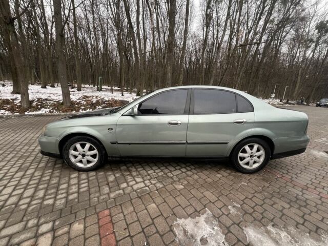 Зеленый Шевроле Эванда, объемом двигателя 2 л и пробегом 245 тыс. км за 1600 $, фото 1 на Automoto.ua