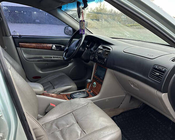 Зеленый Шевроле Эванда, объемом двигателя 2 л и пробегом 240 тыс. км за 1750 $, фото 8 на Automoto.ua