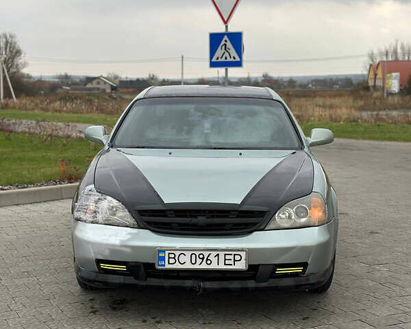 Зеленый Шевроле Эванда, объемом двигателя 2 л и пробегом 240 тыс. км за 1750 $, фото 1 на Automoto.ua