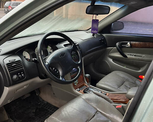 Зелений Шевроле Еванда, об'ємом двигуна 2 л та пробігом 242 тис. км за 1299 $, фото 4 на Automoto.ua