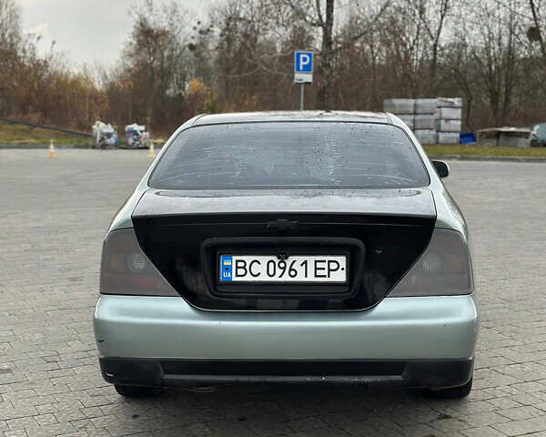 Зеленый Шевроле Эванда, объемом двигателя 2 л и пробегом 240 тыс. км за 1750 $, фото 4 на Automoto.ua