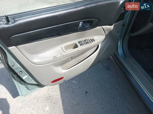 Зеленый Шевроле Эванда, объемом двигателя 2 л и пробегом 287 тыс. км за 2200 $, фото 12 на Automoto.ua