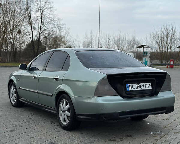 Зеленый Шевроле Эванда, объемом двигателя 2 л и пробегом 240 тыс. км за 1750 $, фото 5 на Automoto.ua