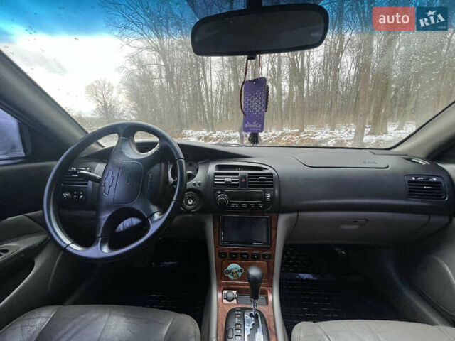 Зеленый Шевроле Эванда, объемом двигателя 2 л и пробегом 245 тыс. км за 1750 $, фото 5 на Automoto.ua