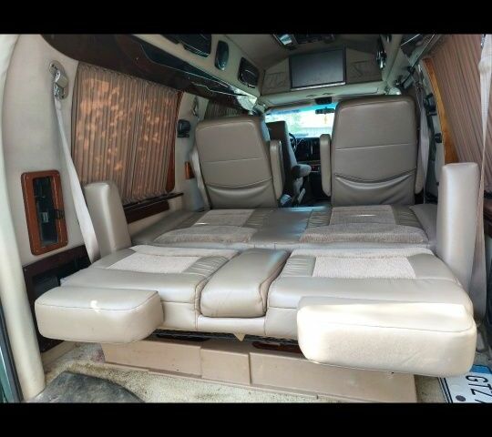 Зеленый Шевроле Експресс, объемом двигателя 5.7 л и пробегом 240 тыс. км за 5600 $, фото 6 на Automoto.ua