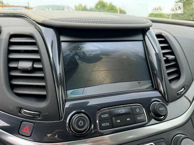 Белый Шевроле Импала, объемом двигателя 3.56 л и пробегом 66 тыс. км за 2700 $, фото 13 на Automoto.ua