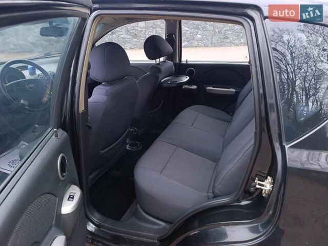 Черный Шевроле Калос, объемом двигателя 1.4 л и пробегом 167 тыс. км за 5299 $, фото 19 на Automoto.ua