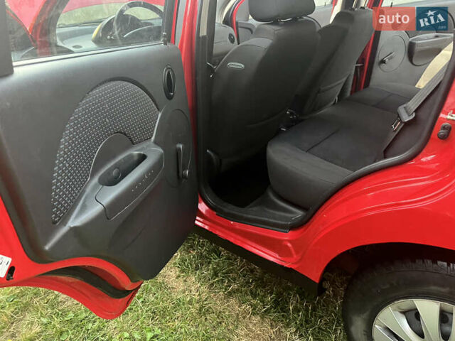 Червоний Шевроле Калос, об'ємом двигуна 1.2 л та пробігом 177 тис. км за 3159 $, фото 9 на Automoto.ua