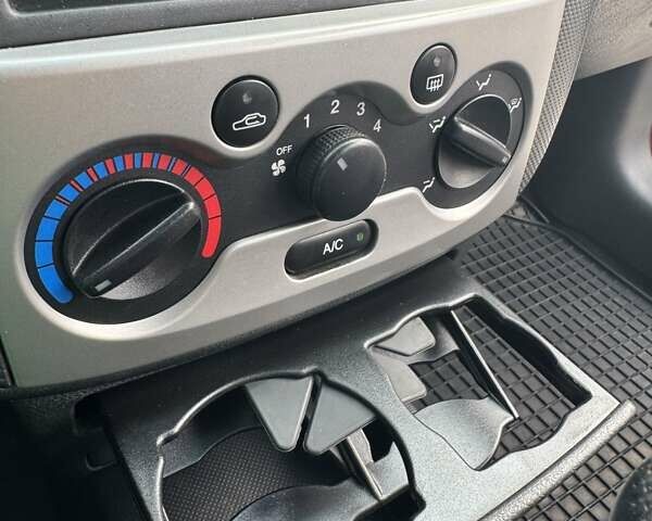 Червоний Шевроле Калос, об'ємом двигуна 1.4 л та пробігом 82 тис. км за 4200 $, фото 14 на Automoto.ua