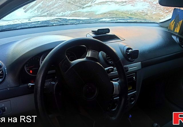 Белый Шевроле Лачетти, объемом двигателя 1.6 л и пробегом 235 тыс. км за 3800 $, фото 3 на Automoto.ua