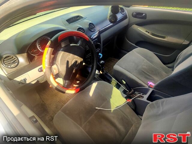 Білий Шевроле Лачетті, об'ємом двигуна 1.6 л та пробігом 325 тис. км за 3500 $, фото 7 на Automoto.ua