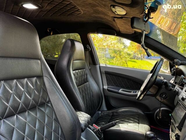 Білий Шевроле Лачетті, об'ємом двигуна 1.8 л та пробігом 112 тис. км за 5290 $, фото 27 на Automoto.ua