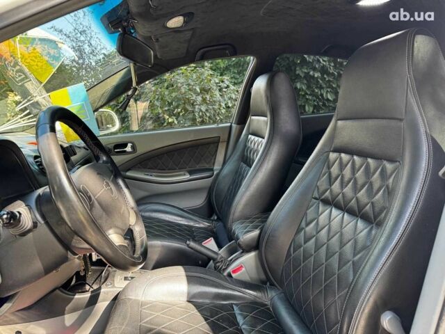 Білий Шевроле Лачетті, об'ємом двигуна 1.8 л та пробігом 112 тис. км за 5290 $, фото 18 на Automoto.ua