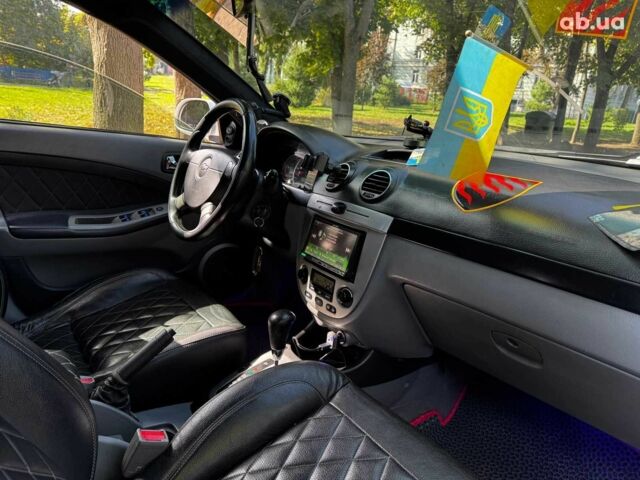 Білий Шевроле Лачетті, об'ємом двигуна 1.8 л та пробігом 112 тис. км за 5290 $, фото 25 на Automoto.ua