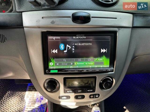 Білий Шевроле Лачетті, об'ємом двигуна 1.8 л та пробігом 112 тис. км за 5290 $, фото 13 на Automoto.ua