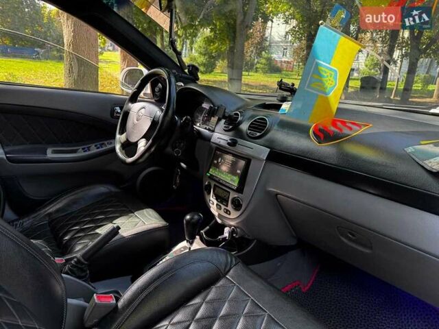 Білий Шевроле Лачетті, об'ємом двигуна 1.8 л та пробігом 112 тис. км за 5290 $, фото 25 на Automoto.ua