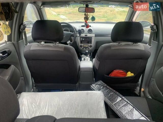 Белый Шевроле Лачетти, объемом двигателя 1.8 л и пробегом 206 тыс. км за 4700 $, фото 5 на Automoto.ua