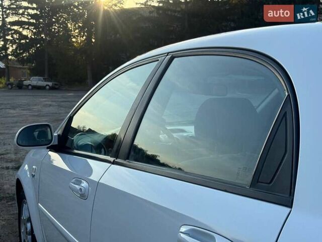 Белый Шевроле Лачетти, объемом двигателя 1.8 л и пробегом 180 тыс. км за 5450 $, фото 26 на Automoto.ua