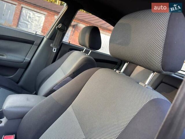 Белый Шевроле Лачетти, объемом двигателя 1.8 л и пробегом 180 тыс. км за 5450 $, фото 36 на Automoto.ua