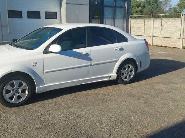 Белый Шевроле Лачетти, объемом двигателя 1.8 л и пробегом 224 тыс. км за 3999 $, фото 12 на Automoto.ua