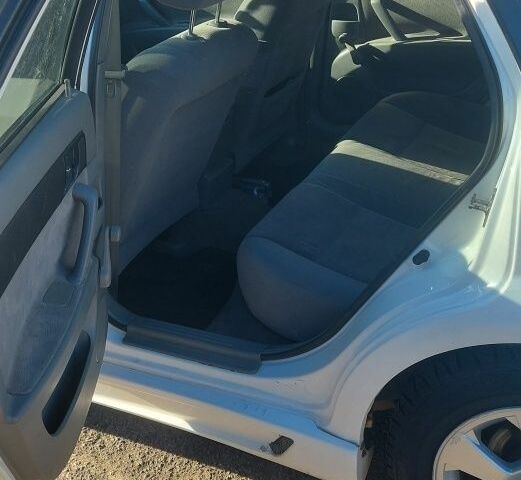 Белый Шевроле Лачетти, объемом двигателя 1.8 л и пробегом 224 тыс. км за 3999 $, фото 3 на Automoto.ua