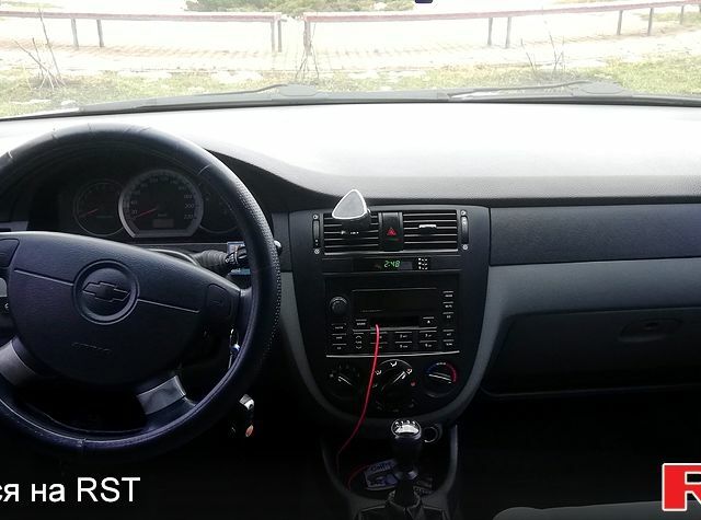 Белый Шевроле Лачетти, объемом двигателя 1.8 л и пробегом 290 тыс. км за 3700 $, фото 10 на Automoto.ua