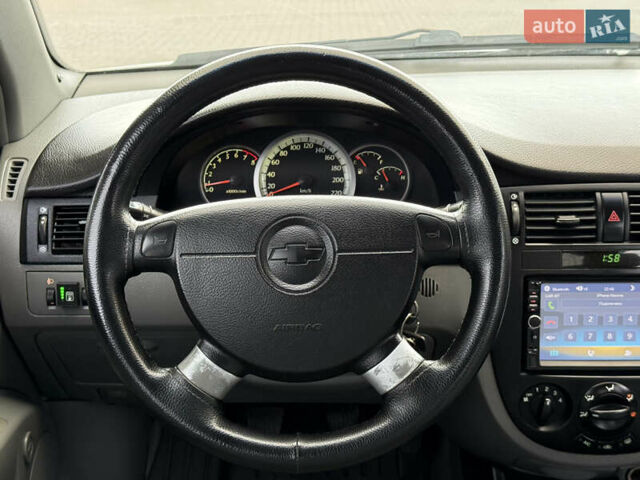 Белый Шевроле Лачетти, объемом двигателя 1.8 л и пробегом 236 тыс. км за 3900 $, фото 21 на Automoto.ua