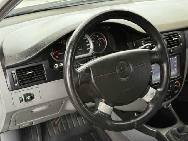 Белый Шевроле Лачетти, объемом двигателя 1.8 л и пробегом 236 тыс. км за 3900 $, фото 18 на Automoto.ua