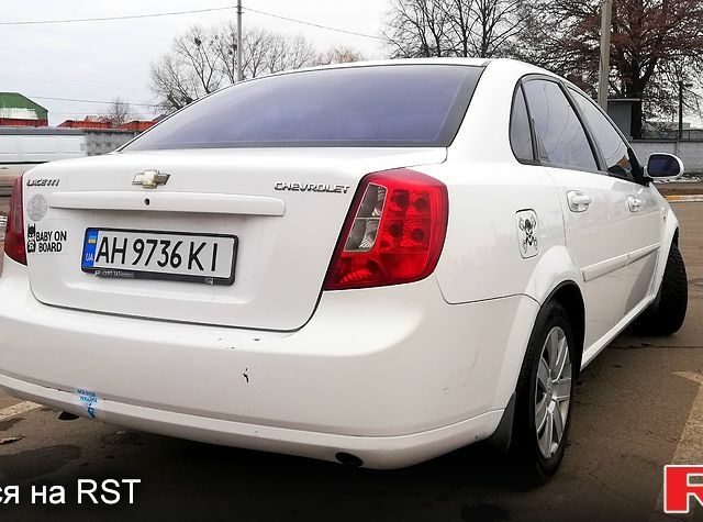 Белый Шевроле Лачетти, объемом двигателя 1.8 л и пробегом 290 тыс. км за 3700 $, фото 2 на Automoto.ua