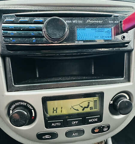 Белый Шевроле Лачетти, объемом двигателя 1.8 л и пробегом 270 тыс. км за 3625 $, фото 11 на Automoto.ua