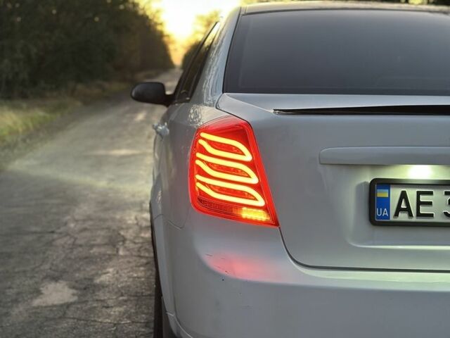 Белый Шевроле Лачетти, объемом двигателя 1.6 л и пробегом 211 тыс. км за 4800 $, фото 13 на Automoto.ua