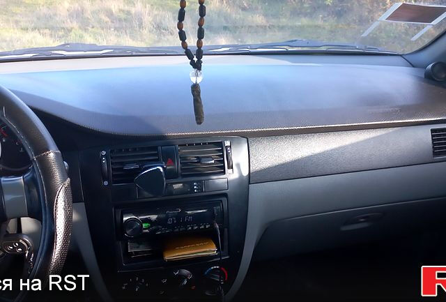 Білий Шевроле Лачетті, об'ємом двигуна 1.8 л та пробігом 325 тис. км за 4000 $, фото 4 на Automoto.ua