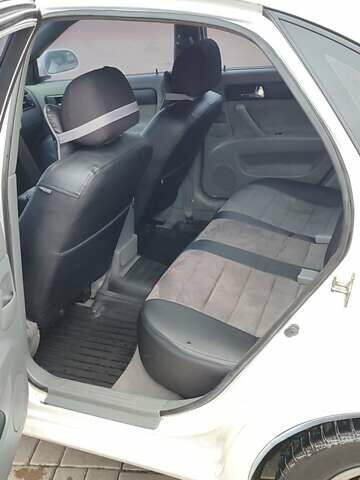 Белый Шевроле Лачетти, объемом двигателя 1.8 л и пробегом 288 тыс. км за 4900 $, фото 13 на Automoto.ua