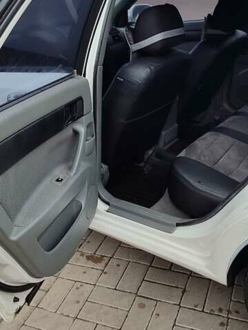 Белый Шевроле Лачетти, объемом двигателя 1.8 л и пробегом 288 тыс. км за 4900 $, фото 14 на Automoto.ua