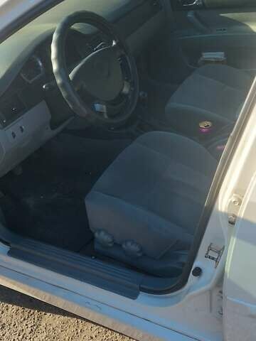 Белый Шевроле Лачетти, объемом двигателя 1.8 л и пробегом 225 тыс. км за 3500 $, фото 12 на Automoto.ua