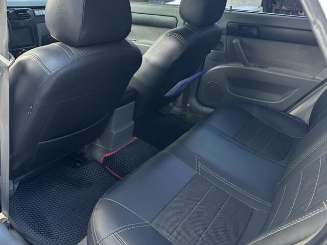 Белый Шевроле Лачетти, объемом двигателя 1.6 л и пробегом 217 тыс. км за 4100 $, фото 10 на Automoto.ua