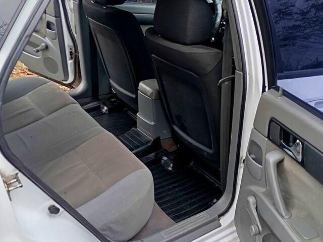 Белый Шевроле Лачетти, объемом двигателя 1.8 л и пробегом 356 тыс. км за 3600 $, фото 11 на Automoto.ua