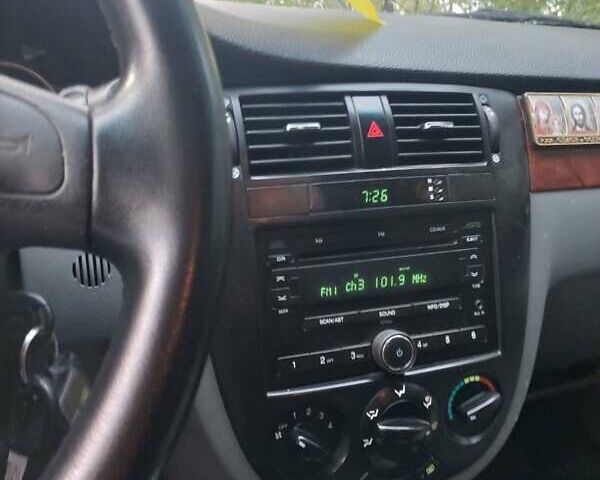 Белый Шевроле Лачетти, объемом двигателя 1.8 л и пробегом 189 тыс. км за 4300 $, фото 12 на Automoto.ua