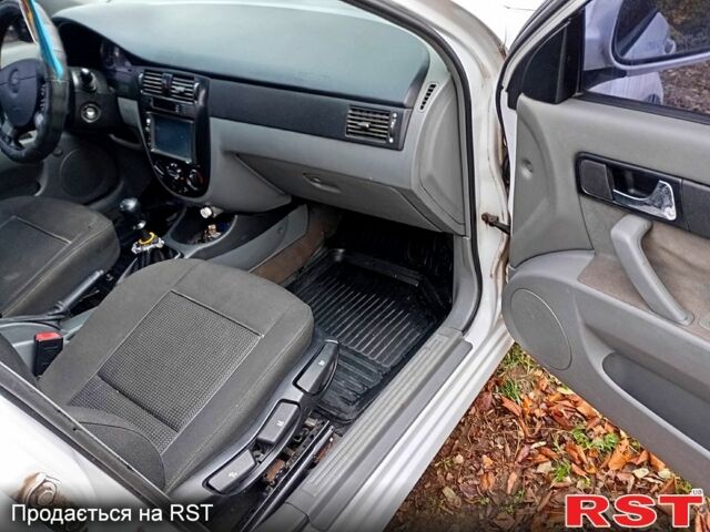 Белый Шевроле Лачетти, объемом двигателя 1.8 л и пробегом 356 тыс. км за 3600 $, фото 12 на Automoto.ua