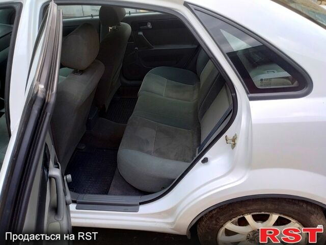 Білий Шевроле Лачетті, об'ємом двигуна 1.8 л та пробігом 212 тис. км за 5100 $, фото 8 на Automoto.ua