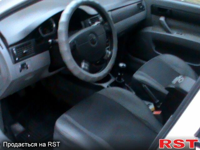 Білий Шевроле Лачетті, об'ємом двигуна 1.6 л та пробігом 200 тис. км за 4098 $, фото 11 на Automoto.ua