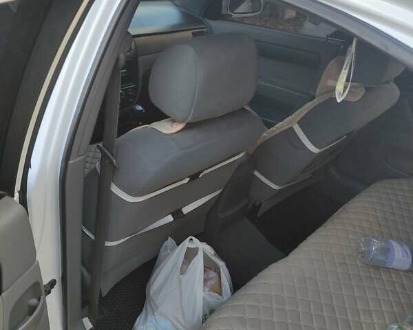 Белый Шевроле Лачетти, объемом двигателя 1.8 л и пробегом 170 тыс. км за 5000 $, фото 7 на Automoto.ua