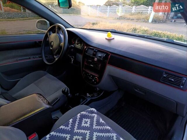 Білий Шевроле Лачетті, об'ємом двигуна 1.6 л та пробігом 192 тис. км за 4750 $, фото 13 на Automoto.ua